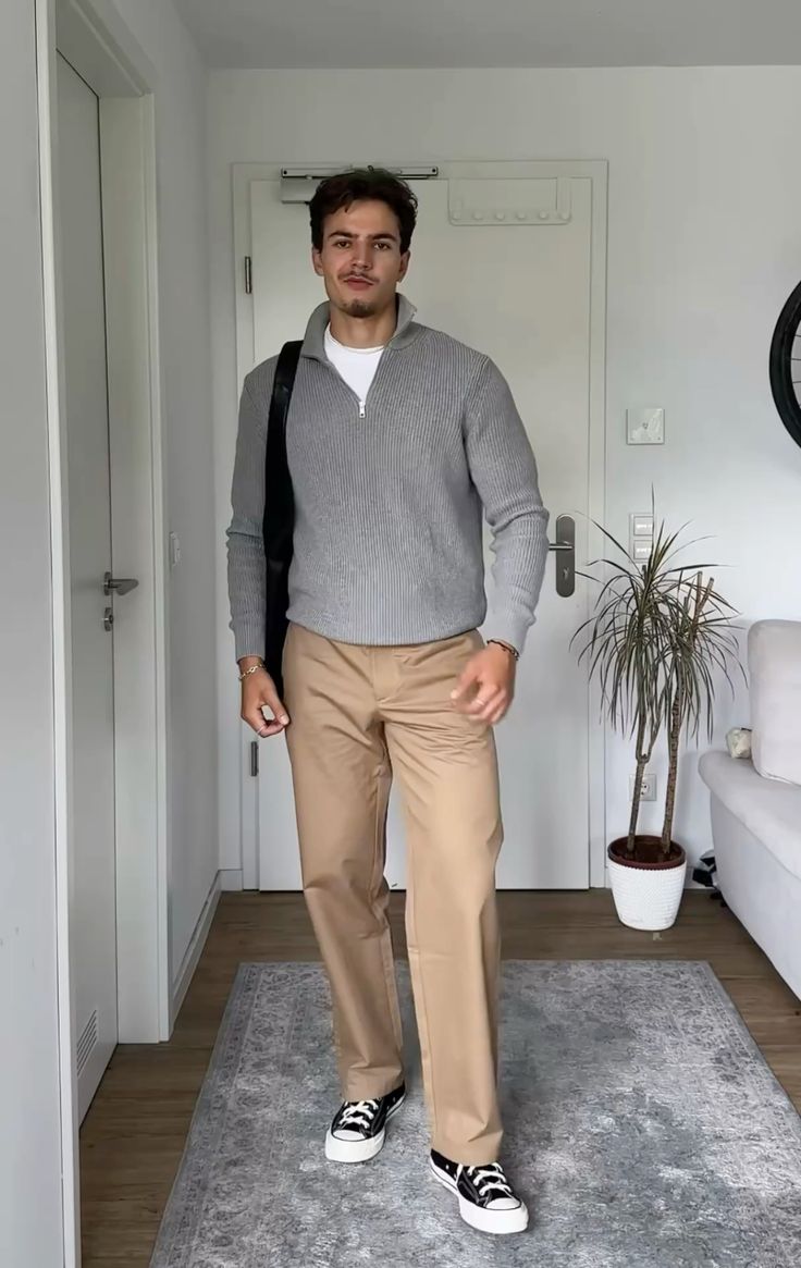 Casual outfit with jeans, button-up shirt, and sweater