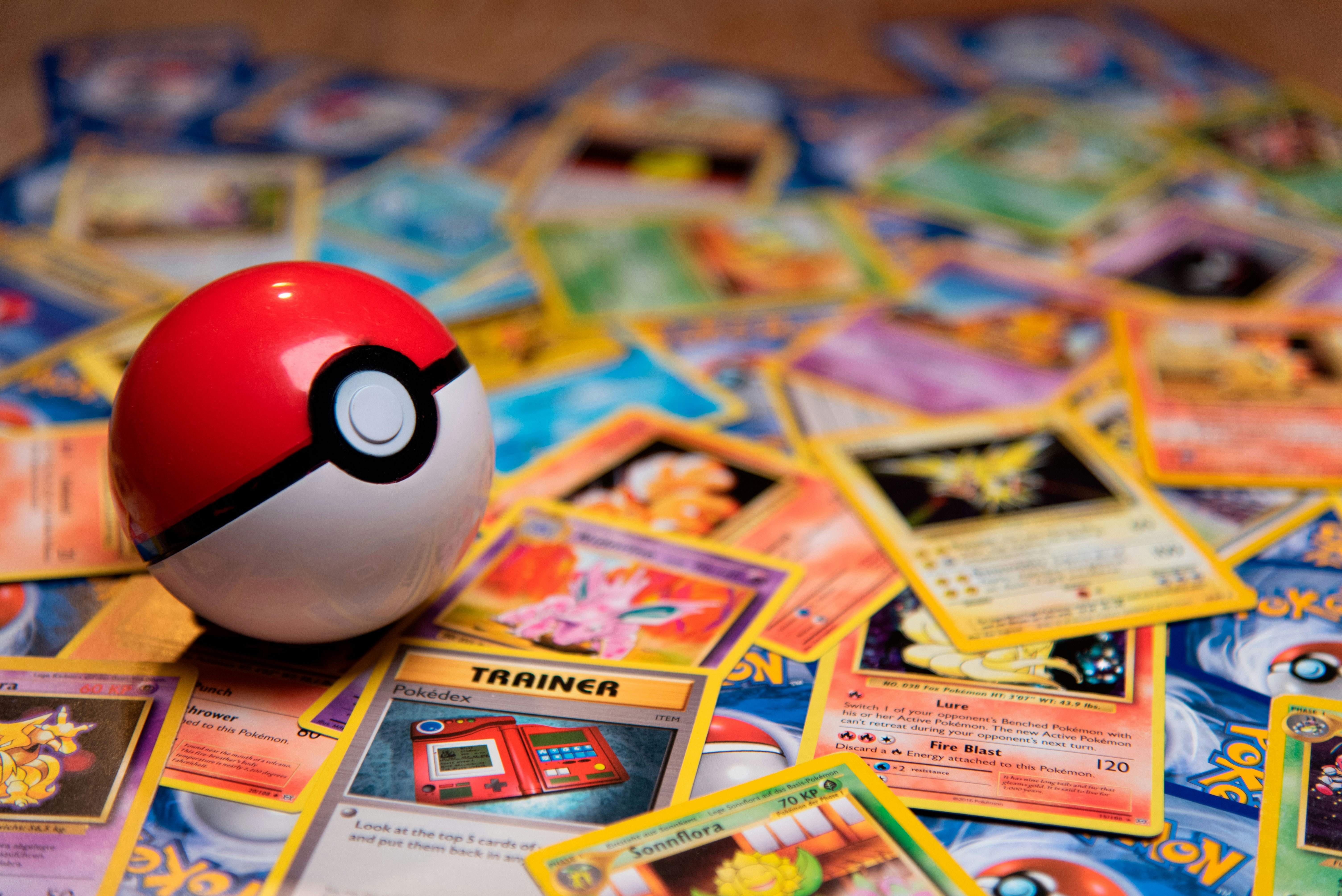 A pokeball on pokemon cards