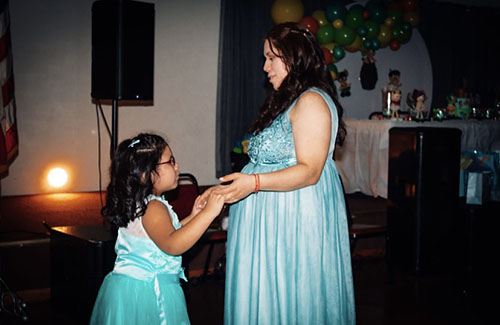 Mom and daughter dancing
