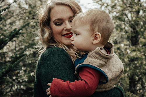 Mother and son at Christmas tree farm