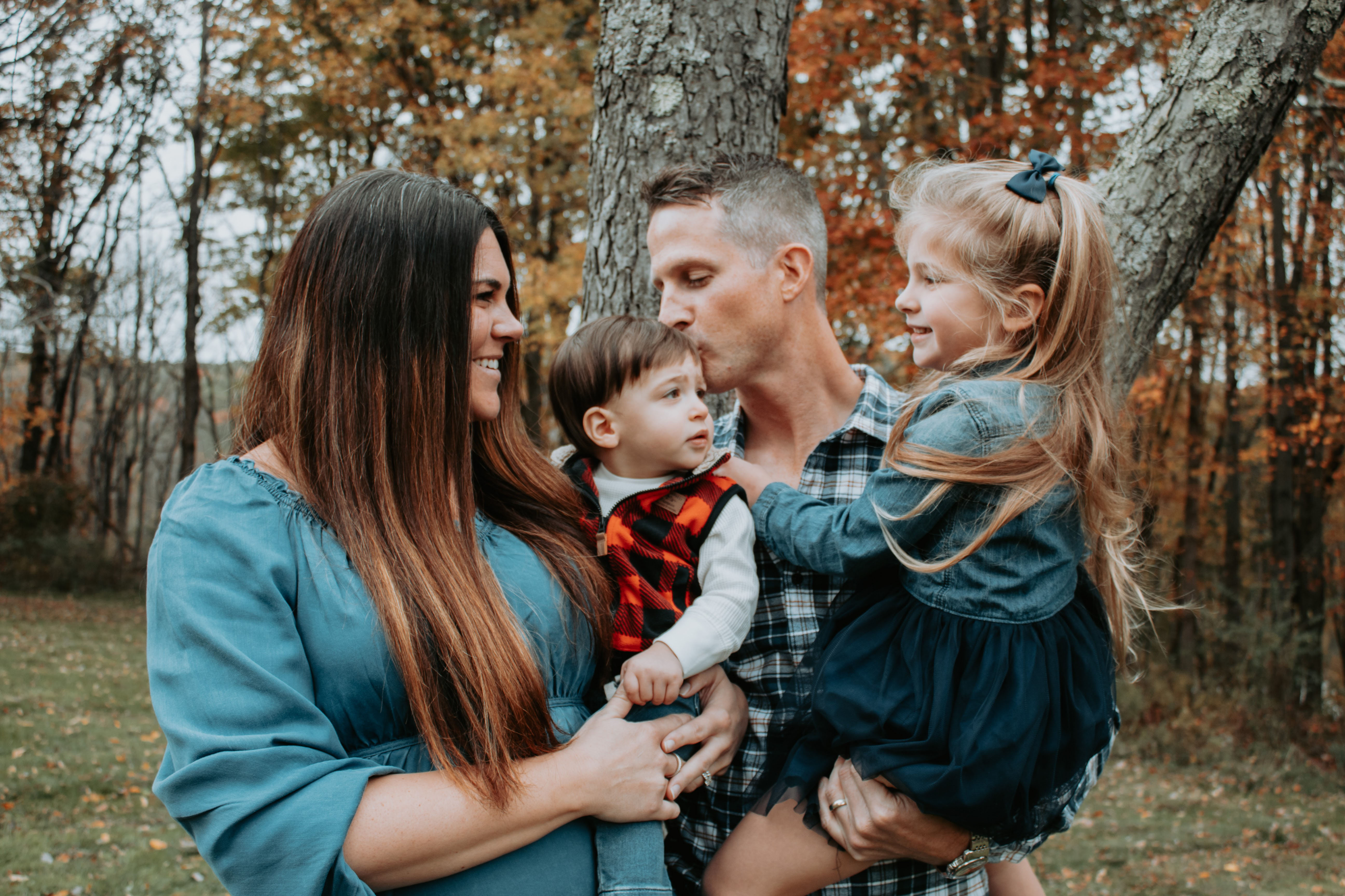 Family photo with fall leaves