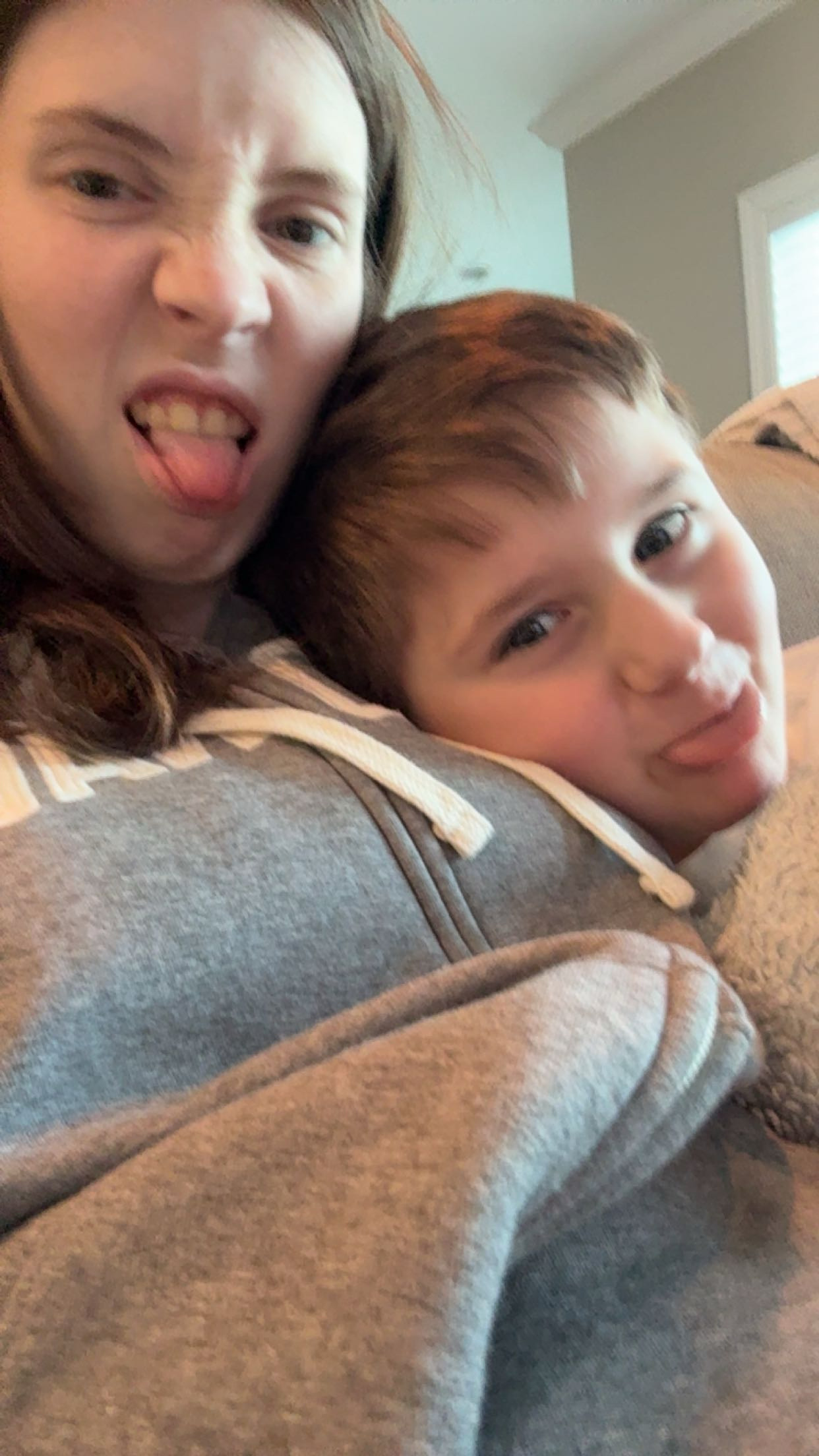 boys eating with Mya at the table