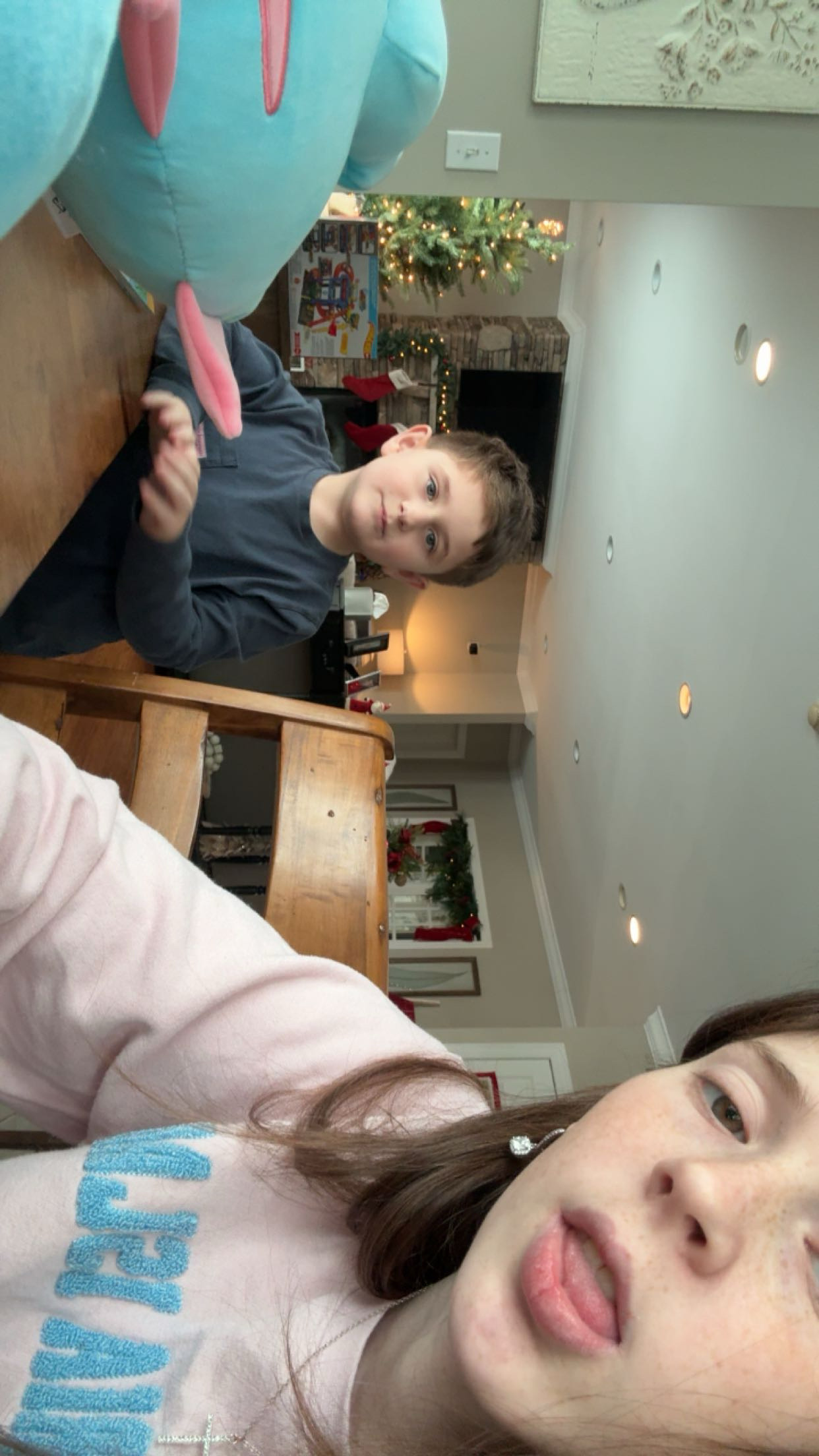 boys eating with Mya at the table