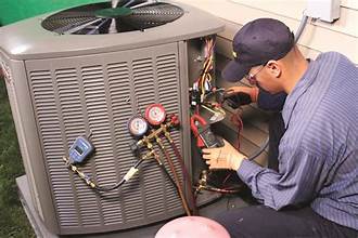 Picture of man repairing unit